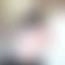 Mid skin fade crew cut, with the fringe longer then the rest. Profile view