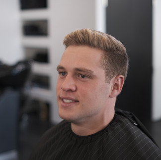 Classic Crew Cut, number 3 on sides with sweeping longer hair on top, Front of haircut