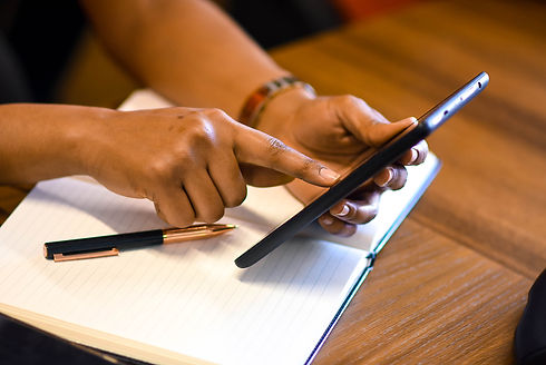 CHS Woman with phone pen journal.jpg