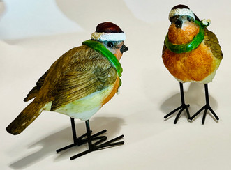 2 robins wearing Christmas hats and scarves