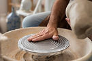 close-up-hands-doing-pottery 1