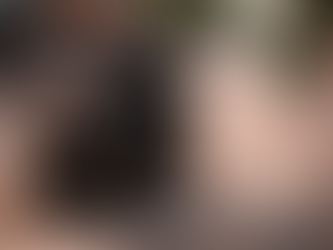 Motorcyclist performing a controlled U-turn on an Indian road