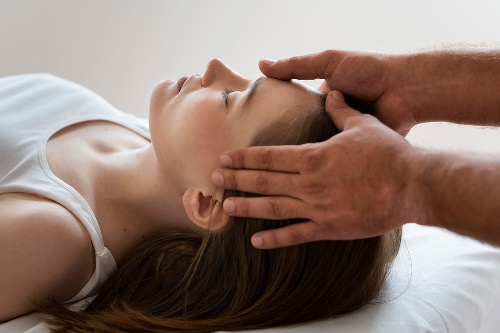 A woman receives a soothing lymphatic facial massage aimed at alleviating sinus issues.
