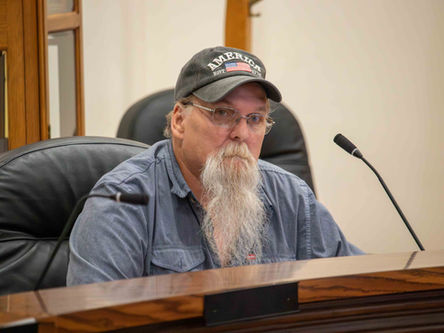 Commissioners discuss health insurance and Community Crossings grant eligibility