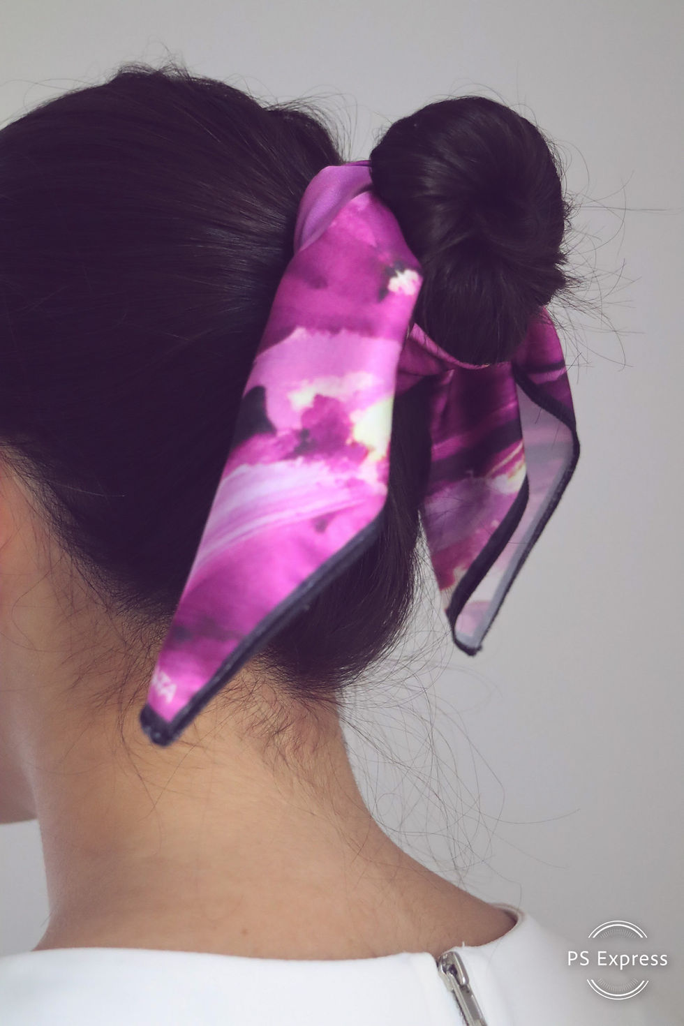 CARMENTA - model wearing scarf ribbon in knot tutorial, Costa Rica design and art printed on fabric
