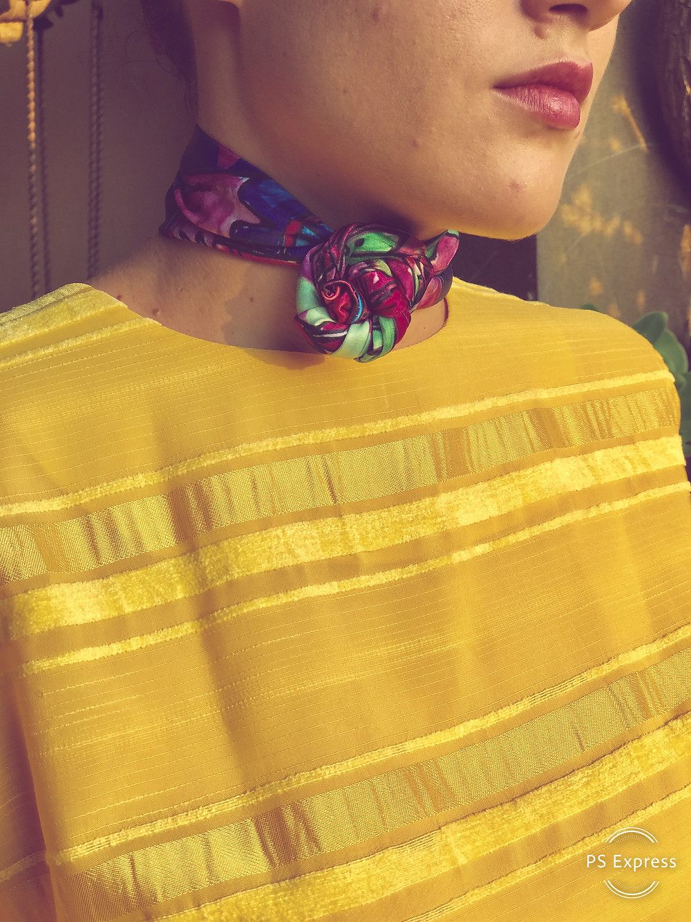 CARMENTA - model wearing scarf rose knot tutorial, Costa Rica design and art printed on fabric