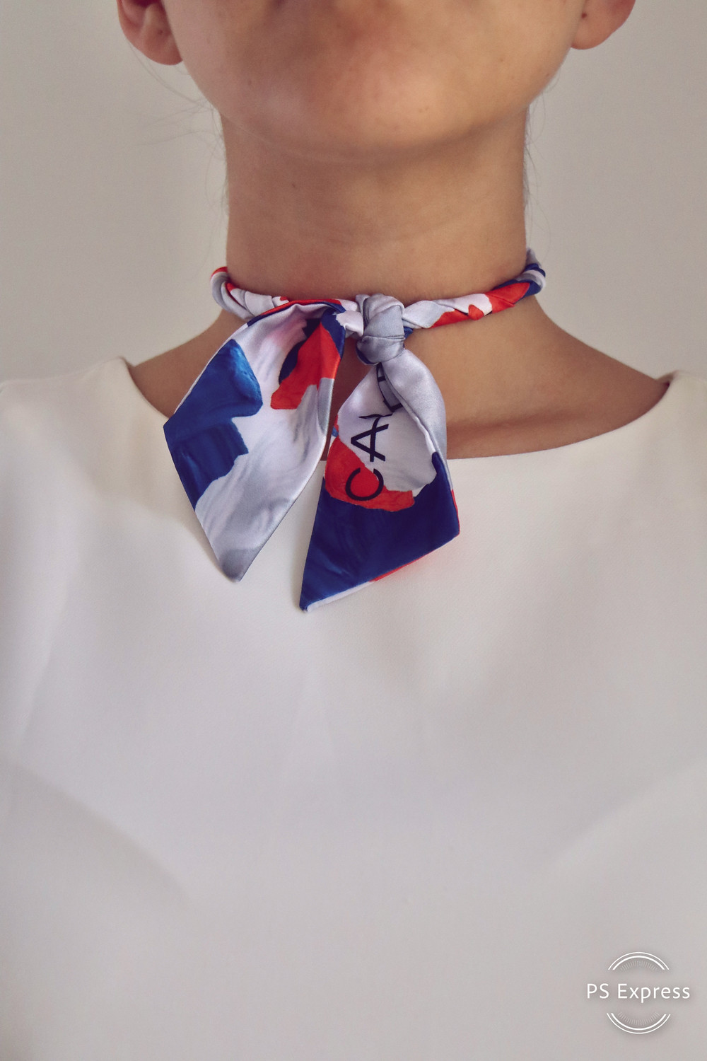 CARMENTA - model wearing twisted knot tutorial, Costa Rica design and art printed on fabric