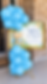 Blue balloon display with Welcome to Our Baby Shower sign