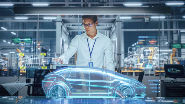 Augmented reality, AR, automotive industry, vehicle design, manufacturing, customer experience, virtual design, collaboration, productivity, sustainability, environmental impact, innovation, technology, personalized experience, visualization, real-time testing, waste reduction, design optimization, data quality, technical issues, production efficiency, worker training, stakeholder collaboration, personalized vehicle customization, design process acceleration, faster decision-making, manufacturing efficiency, error reduction, engaging customer experience