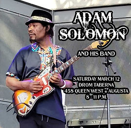 An image of Adam Solomon, wearing a hat and an African-style shirt, plays a guitar on a stage. Text describes a live performance 