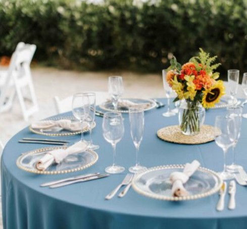 Thumbnail: Elegant outdoor wedding table setting with sunflowers