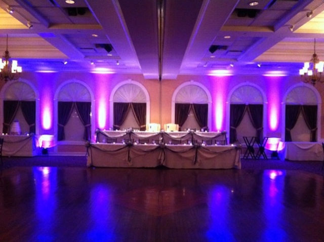 Thumbnail: event with reflection of blue and purple uplights