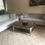 Thumbnail: Z Gallerie Coffee Table - Antique gold painted wood and Mirrored Top