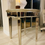 Thumbnail: Gorgeous Glasstop End Table - Antique gold painted wood and Mirrored Top