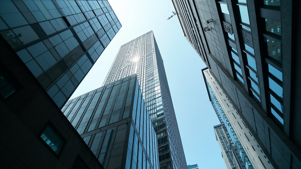 Eye-level view of a luxury skyscraper in an urban setting