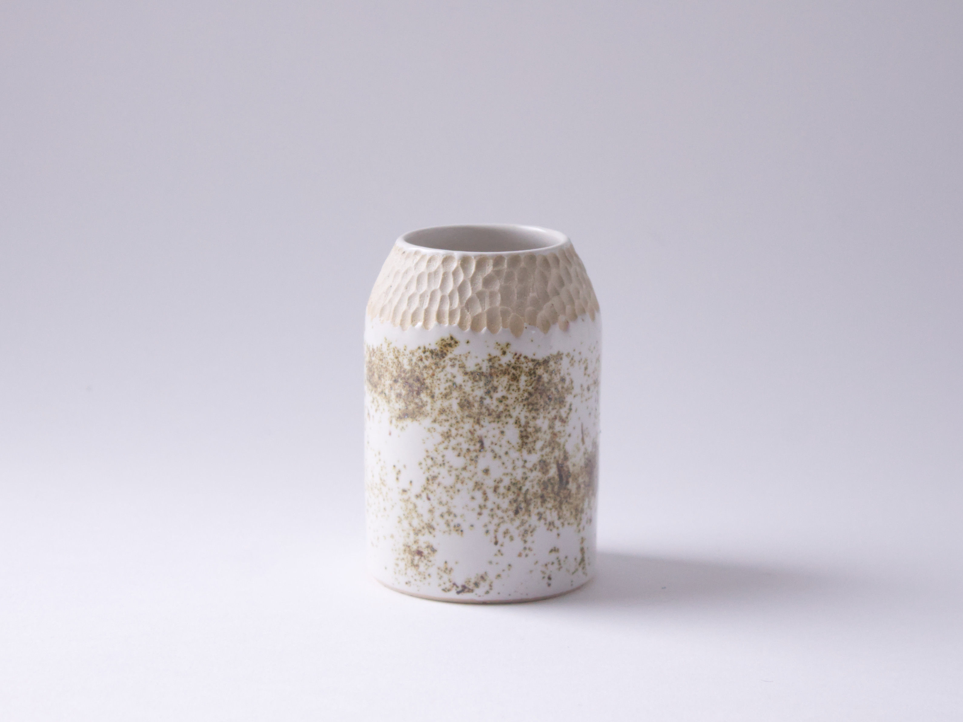 Stoneware vase with iron speckle effect glaze