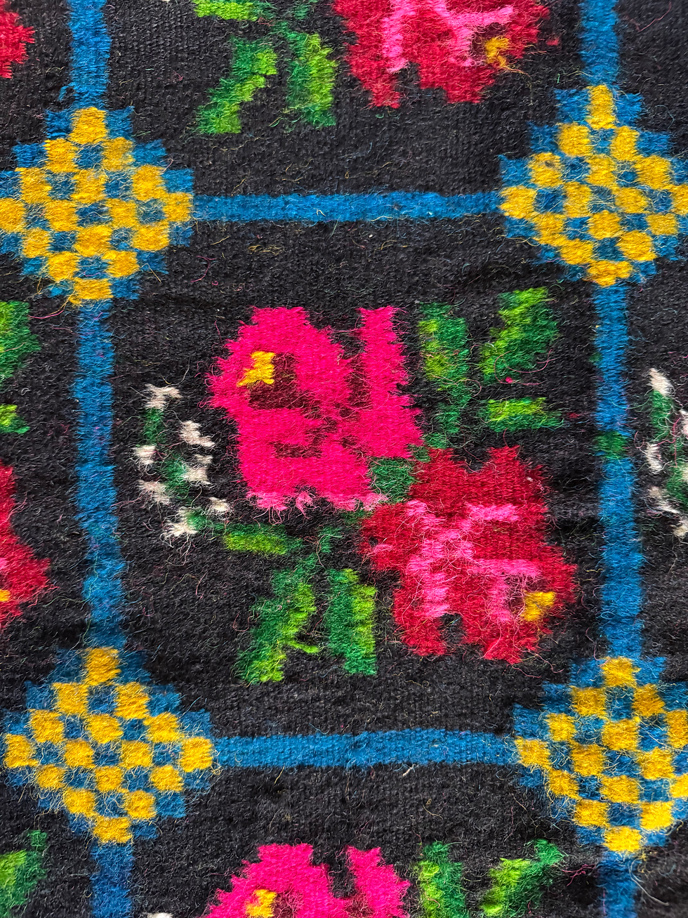Thumbnail: Colorful handwoven carpet with pink roses