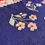 Miniaturbild: Beautiful floral Oltenia carpet on a blue and red background 