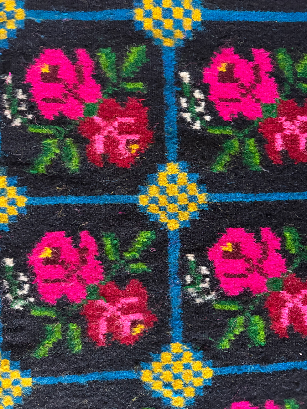 Thumbnail: Colorful handwoven carpet with pink roses