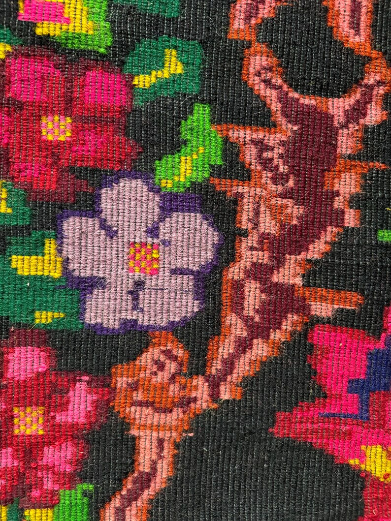 Thumbnail: Bohemian handwoven wool rug, black background with colorful floral design