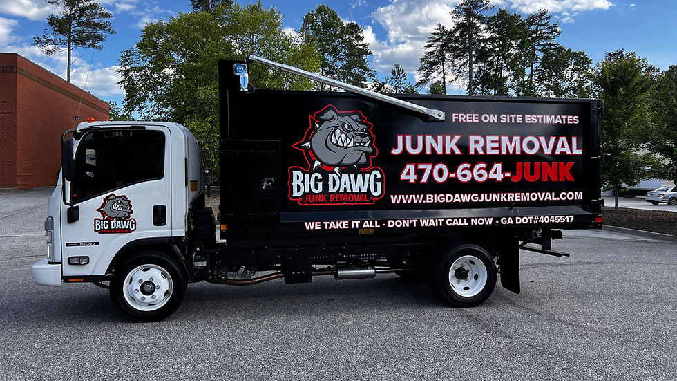 Eye-level view of a junk removal truck parked in front of a residential house