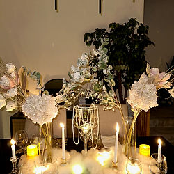 A high-end tablescape featuring luxury tableware, personalized décor, and upscale design elements for weddings and private gatherings