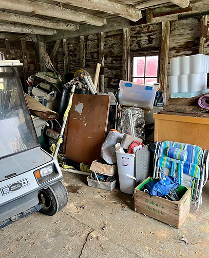 Cluttered barn in Hinesburg Vermont before Junkit’s eco-friendly junk removal and cleanout service
