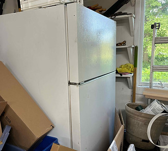 Old refrigerator ready for eco-friendly appliance removal in Shelburne Vermont