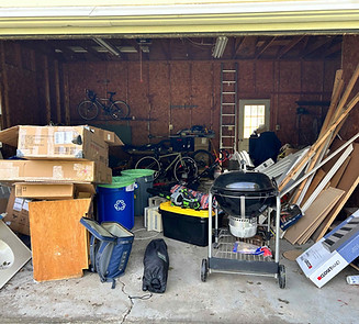 Cluttered garage prepared for cleanout by Junkit in Charlotte Vermont
