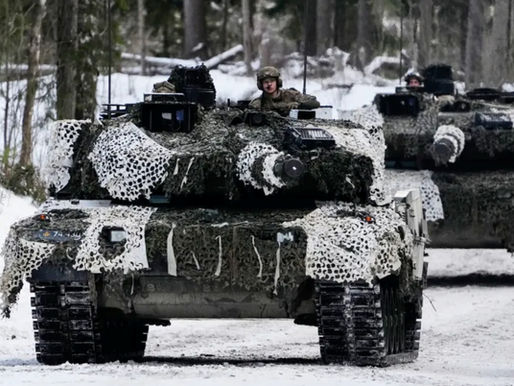 Manned military tanks in winter