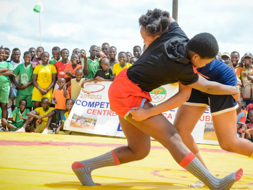 Two African teenagers wrestling