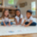 u6325553383_Montessori_classroom_three_smiling_and_focused_si_790defef-dc13-45f0-b931-c682
