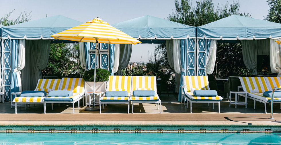 Pool with loungers and cabanas