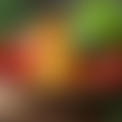 Bell peppers tomatoes vegetables in a bowl on counter