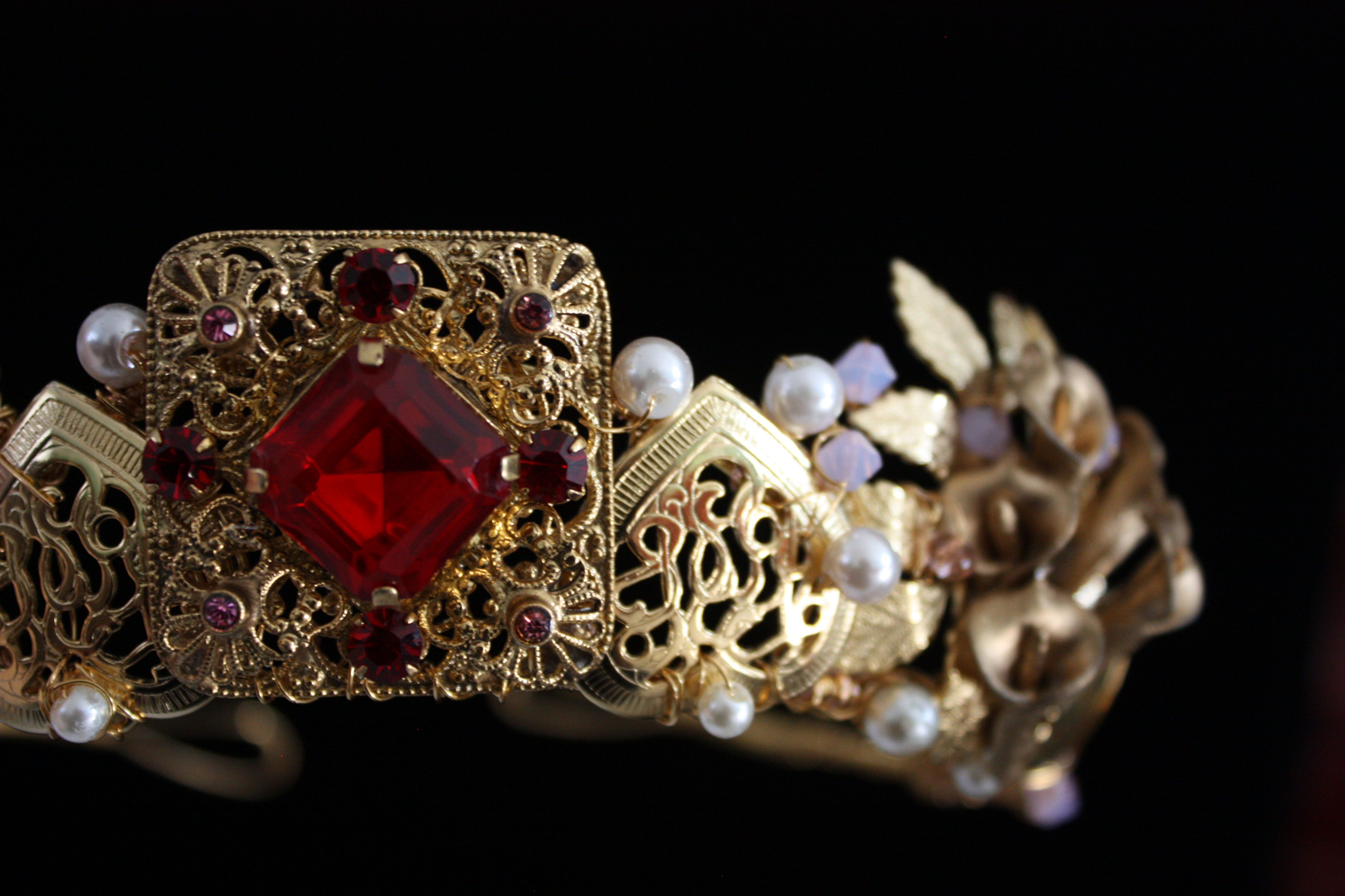 Ruby red and gold tiara with pearls