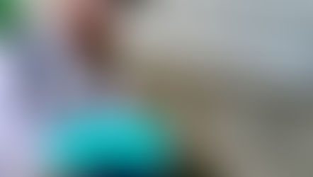 A LOCAL Bug Guy technician sprays a home exterior for pests