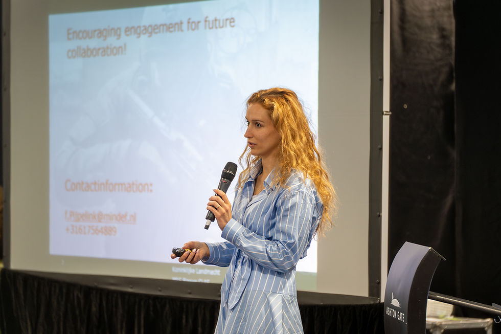 Woman in Defence, Security, and Medicine Speaking