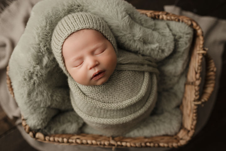 newborn posed in studio