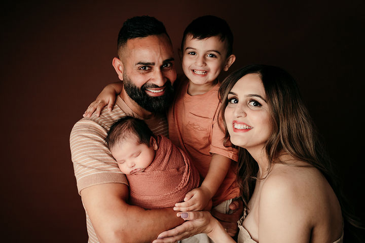newborn posed in studio