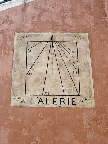 Sundial on house