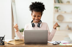 Little Winner. Excited Black Girl At Laptop Gesturing Yes Getting A-Grade During Webinar A