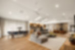 Interior repaint of an open-plan living and dining room with vaulted white ceiling, McAskill Coatings Sydney