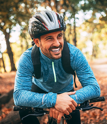 Man-Similing-On-Bike