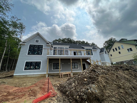 A luxury Connecticut custom home crafted by Uccello Fine Homes, showcasing refined architectural detailing, high-end materials, and exceptional craftsmanship. The image presents a beautifully designed residence with elegant millwork, expansive windows, and sophisticated interior and exterior finishes that represent the brand’s commitment to quality custom home building, remodeling, coastal construction, and sustainable design.