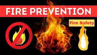 Flames with "FIRE PREVENTION" text in bold red. A no-fire symbol and "Fire Safety" text emphasize safety theme. Black background.