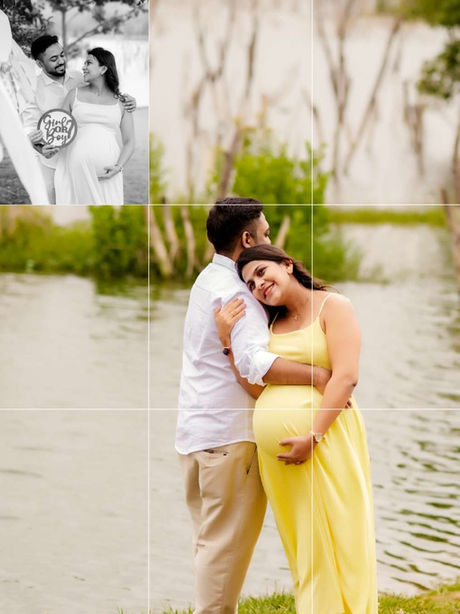 Pregnant woman in a yellow dress hugging her partner by a lake.