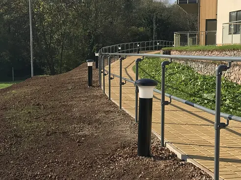 Pathway with galvanised railings