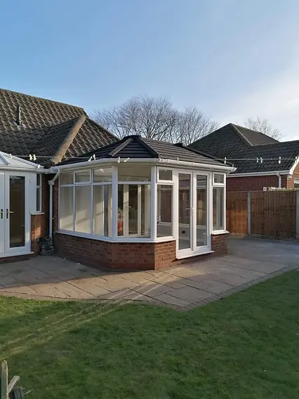 Conservatory with a solid roof