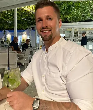 James Sweet smiling at camera