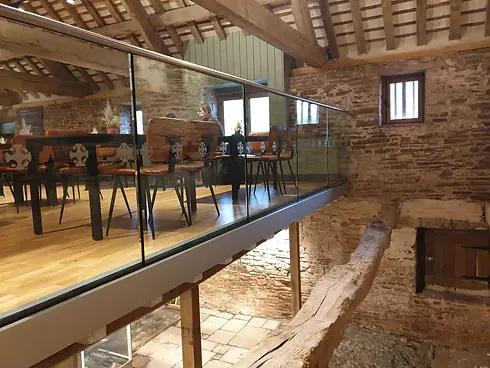 Glass balcony in stone room